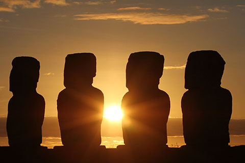 Mo'ai statues carved by the Rapa Nui people on Easter Island in Chile. Stock image from Unsplash.